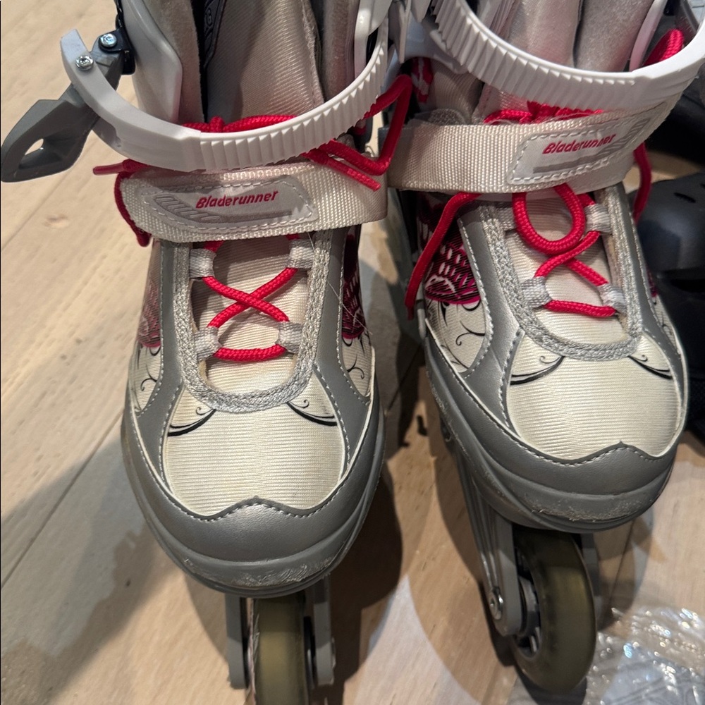 White and Red Bladerunner Rollerblades Adjustable 5-8 + knee, elbow, hand pads
